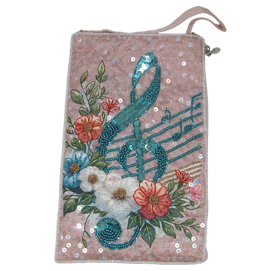 A rectangular pink sequined clutch or pouch with a wrist strap, decorated with a teal ribbon, musical notes, and colorful flowers on a white background.