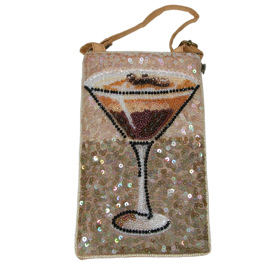A small rectangular clutch bag covered in beige and gold sequins, featuring a beaded martini glass design on the front and a tan shoulder strap.